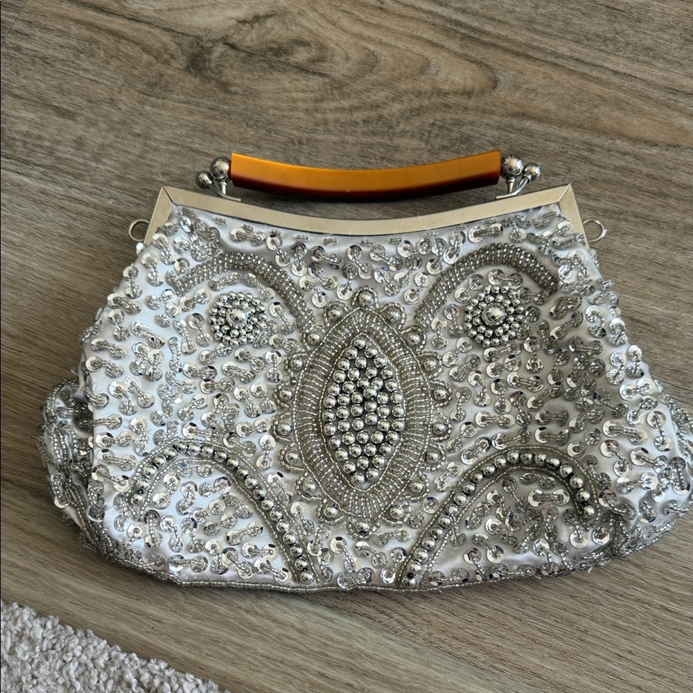 Elegant Silver Beaded Clutch
